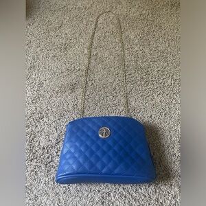 cross body bag has 3 storage compartments